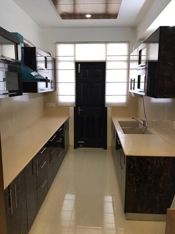 Kitchen in 3 BHK Apartment at Golden Sand Apartments, Dhakoli – for Sale