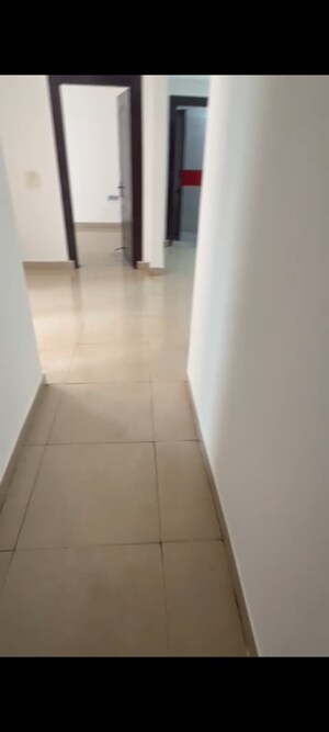 Building Lobby in 2.5 BHK Apartment at Amrapali Empire, Sain Vihar – for Sale