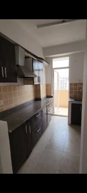 Kitchen in 2 BHK Apartment at Amrapali Empire, Sain Vihar – for Sale