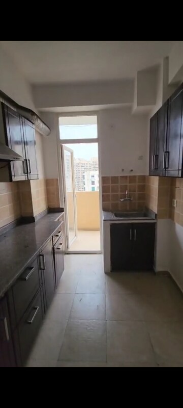 Kitchen in 2 BHK Apartment at Amrapali Empire, Sain Vihar – for Sale