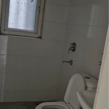Bathroom in 3 BHK Apartment at Dhoot Time Residency, Sector 63 – for Rent