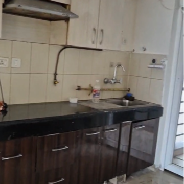 Kitchen in 3 BHK Apartment at Dhoot Time Residency, Sector 63 – for Rent