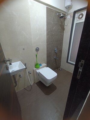 Bathroom in 1 BHK Apartment at Abrol Signature, Malad West – for Rent