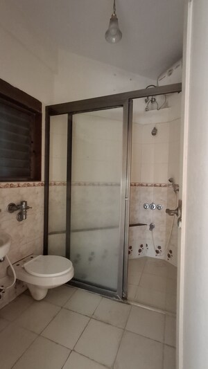 Bathroom in 3 BHK Apartment at Bredco New Viceroy Park , Kandivali East – for Rent