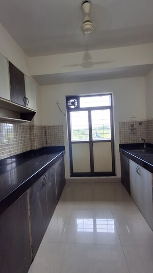 Kitchen in 2 BHK Apartment at Raheja Reflections, Kandivali East – for Rent