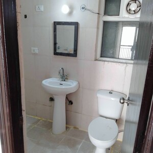 Bathroom in 3 BHK Apartment at Antriksh Golf View, Sector 78 – for Rent