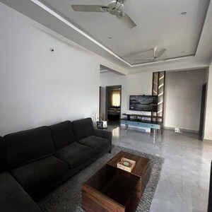 Living Room in 2 BHK Apartment at Prateek Wisteria, Sector 77 – for Rent