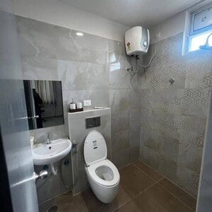 Bathroom in 2 BHK Apartment at Prateek Wisteria, Sector 77 – for Rent