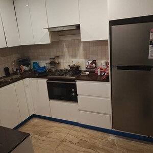 Kitchen in 2 BHK Apartment at Prateek Wisteria, Sector 77 – for Rent