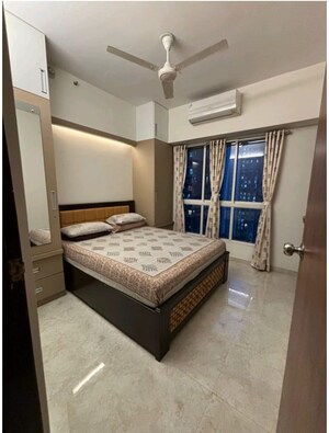 Bedroom in 1 BHK Apartment at Lalani Residency, Kavesar – for Rent