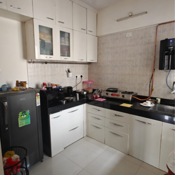 Kitchen in 2 BHK Apartment at Millennium Acropolis 2, Bhagwan Nagar – for Sale