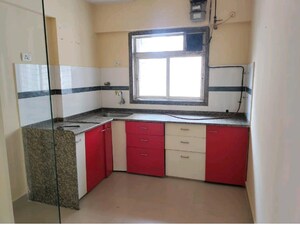 Kitchen in 1 BHK Apartment at Uma Neopolis, Ghodbunder Road – for Sale