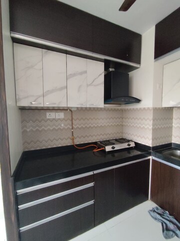 Kitchen in 2 BHK Apartment at Paramount Plaza, Dapode – for Rent