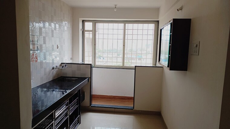 Kitchen, eden-garden-tathawade 2 Bedroom 851 Sq.Ft. Apartment In Tathawade Pune 9219294