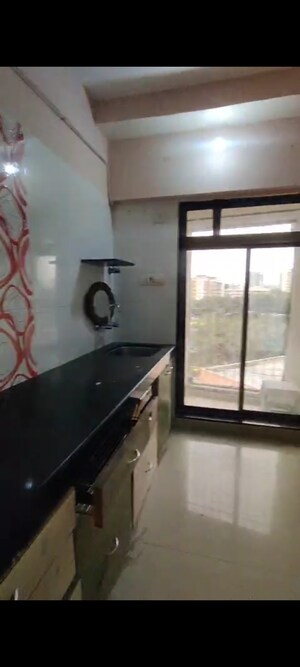 Kitchen in 2 BHK Apartment at Megdoot CHS, Vile Parle East – for Sale
