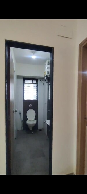 Bathroom in 2 BHK Apartment at Megdoot CHS, Vile Parle East – for Sale