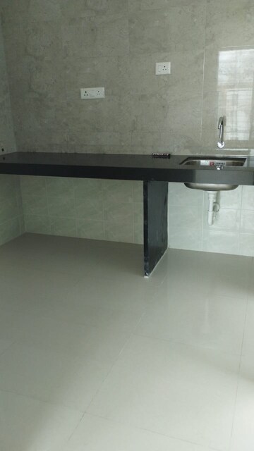 Kitchen in 2 BHK Apartment at Rama Livmo, Hinjewadi – for Rent