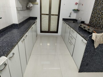 Kitchen in 2 BHK Apartment at Asmita Sand Dunes, Malad West – for Rent