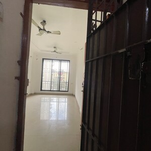 Building Lobby in 1 BHK Apartment at Anmol House, Kopar Khairane Sector 20 – for Sale