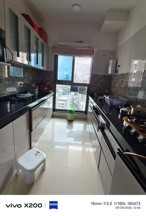 Kitchen in 2 BHK Apartment at Raj Infinia, Malad West – for Rent