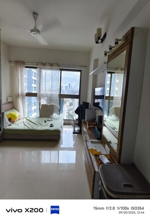 Living Room in 2 BHK Apartment at Raj Infinia, Malad West – for Rent