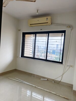 Room in 2 BHK Apartment at K Raheja Palm Spring, Malad West – for Rent