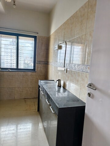 Kitchen in 2 BHK Apartment at K Raheja Palm Spring, Malad West – for Rent