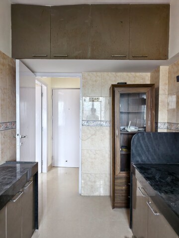 Kitchen in 2 BHK Apartment at K Raheja Palm Spring, Malad West – for Rent