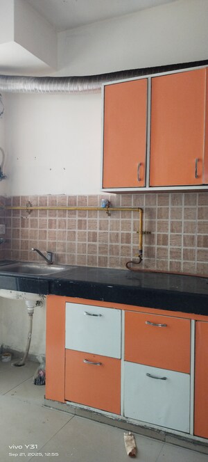 Kitchen in 3 BHK Apartment at Mahagun Mywoods, Sector 16c Greater Noida – for Rent