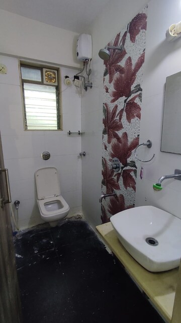 Bathroom in 1 BHK Apartment at M.S.Mody Mickeys Enclave, Malad West – for Rent