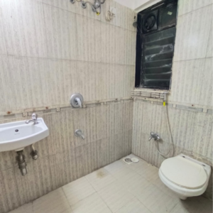 Bathroom in 2 BHK Apartment at Tilak Nagar Building, Tilak Nagar – for Rent