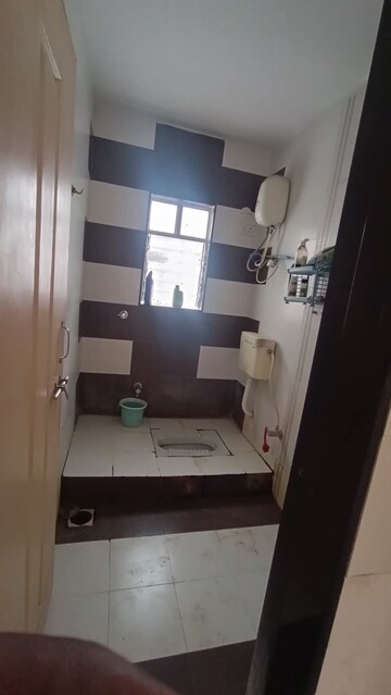 Bathroom in 2 BHK Apartment at Rajveer Palace II, Pimple Saudagar – for Rent