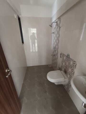 Bathroom in 2 BHK Apartment at Mutha Sai Nirvana, Shahad – for Rent