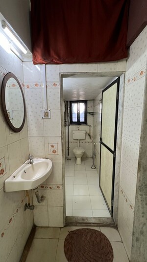 Bathroom in 2 BHK Apartment at Devnani Kailasa, Chembur – for Rent
