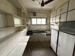 Kitchen in 2 BHK Apartment at Yashodhan Apartments Andheri, Andheri West – for Rent