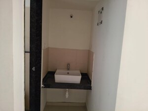 Bathroom in 2 BHK Apartment at Newton Homes Tathawade, Tathawade – for Rent