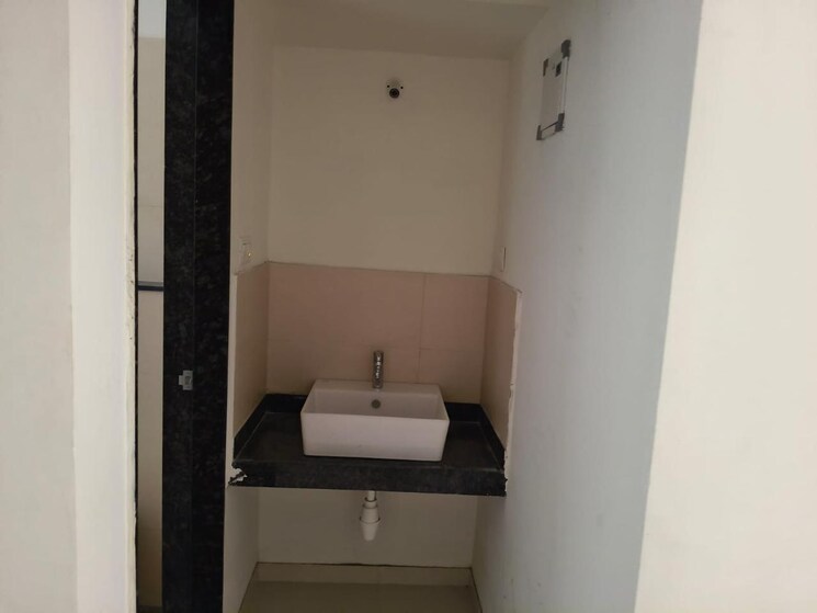 Bathroom, newton-homes-tathawade 2 Bedroom 671 Sq.Ft. Apartment In Tathawade Pune 9219849