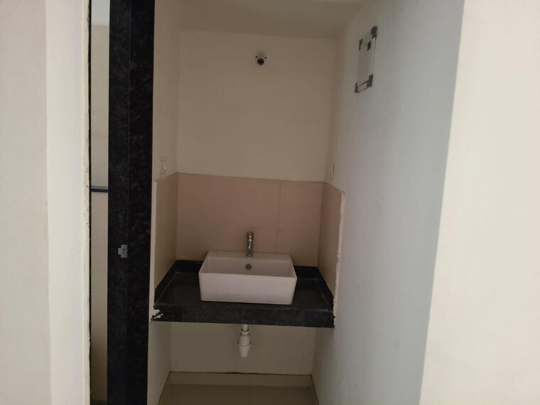 Bathroom, newton-homes-tathawade 2 Bedroom 671 Sq.Ft. Apartment In Tathawade Pune 9219849