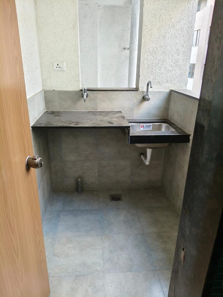 Kitchen, newton-homes-tathawade 2 Bedroom 671 Sq.Ft. Apartment In Tathawade Pune 9219849