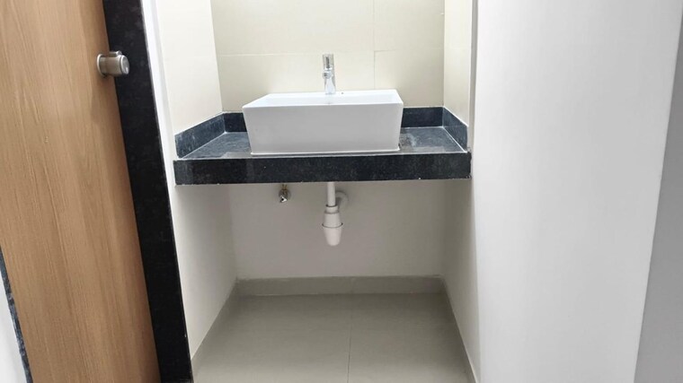 Kitchen, newton-homes-tathawade 2 Bedroom 671 Sq.Ft. Apartment In Tathawade Pune 9219849