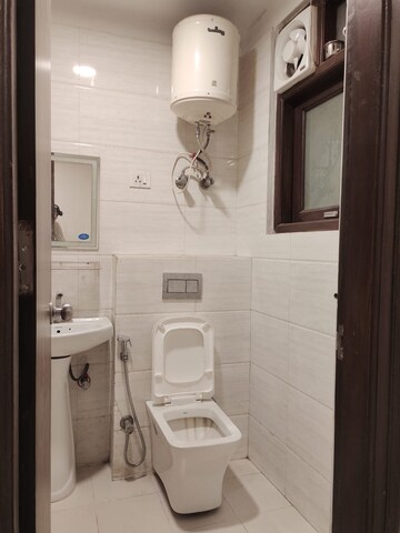 Bathroom in 3 BHK Builder Floor at Palm Residency Chhatarpur, Chattarpur – for Rent