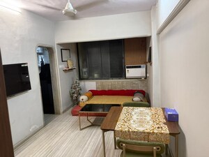 Living Room in 2 BHK Apartment at Rajmatha CHS, Andheri West – for Rent