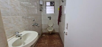 Bathroom in 2 BHK Apartment at Silver Arch Eden woods, Andheri West – for Rent