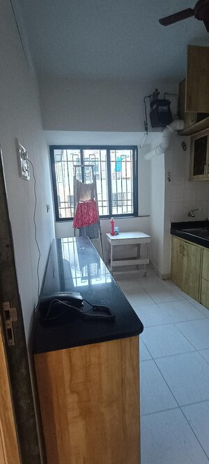 Kitchen in 2 BHK Apartment at Montreal Tower, Andheri West – for Rent
