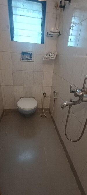 Bathroom in 2 BHK Apartment at Montreal Tower, Andheri West – for Rent