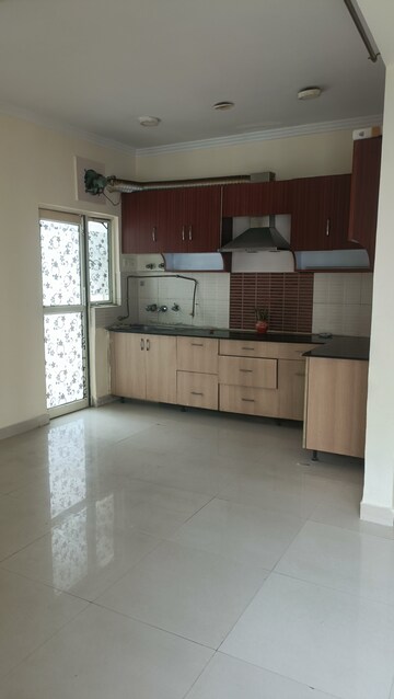 Kitchen in 3 BHK Apartment at Amrapali Crystal Homes, Sector 76 – for Sale