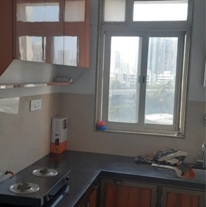 Kitchen in 1 BHK Apartment at Kings Heights, Nahur – for Rent