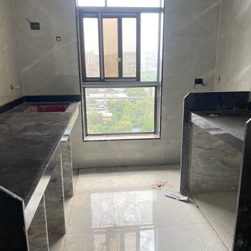 Kitchen in 2 BHK Apartment at Wadhwa Atmosphere O2, Nahur Gaothan – for Rent