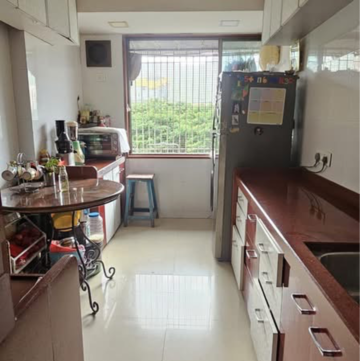 Kitchen in 2 BHK Apartment at GHP Neptune Suncity, Tirandaz – for Rent