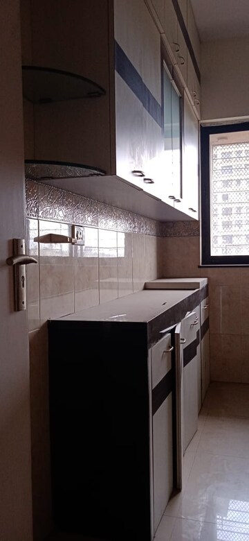 Kitchen in 1 BHK Apartment at Ahimsa Marg, Malad West – for Rent